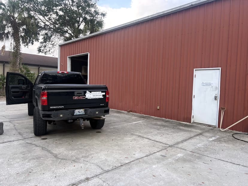 Commercial garage door installation - industrial white roll-up doors