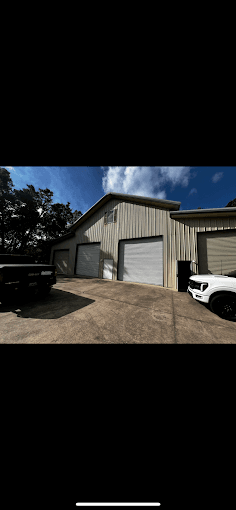 Commercial garage door installed on a business exterior in Central Florida
