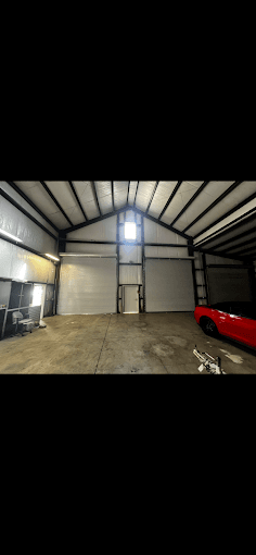 Interior view of a commercial garage door installed at a business facility